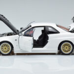 Nissan Skyline GT-R R34 Nismo Z-Tune Hvid MotorHelix 1:18 - image 4 of 11
