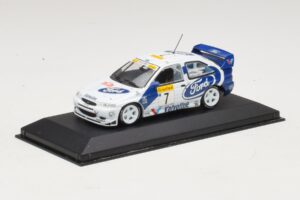 Ford Escort WRC #7 J. Kankkunen / J. Repo Rally Monte Carlo 1998 Minichamps 1:43 430988707 Metal — billede 2 af 4